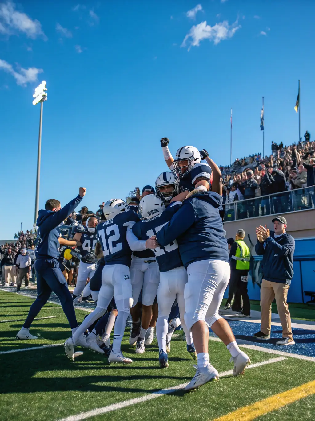 Image of ASG players celebrating a victory, capturing the excitement and camaraderie within the team.